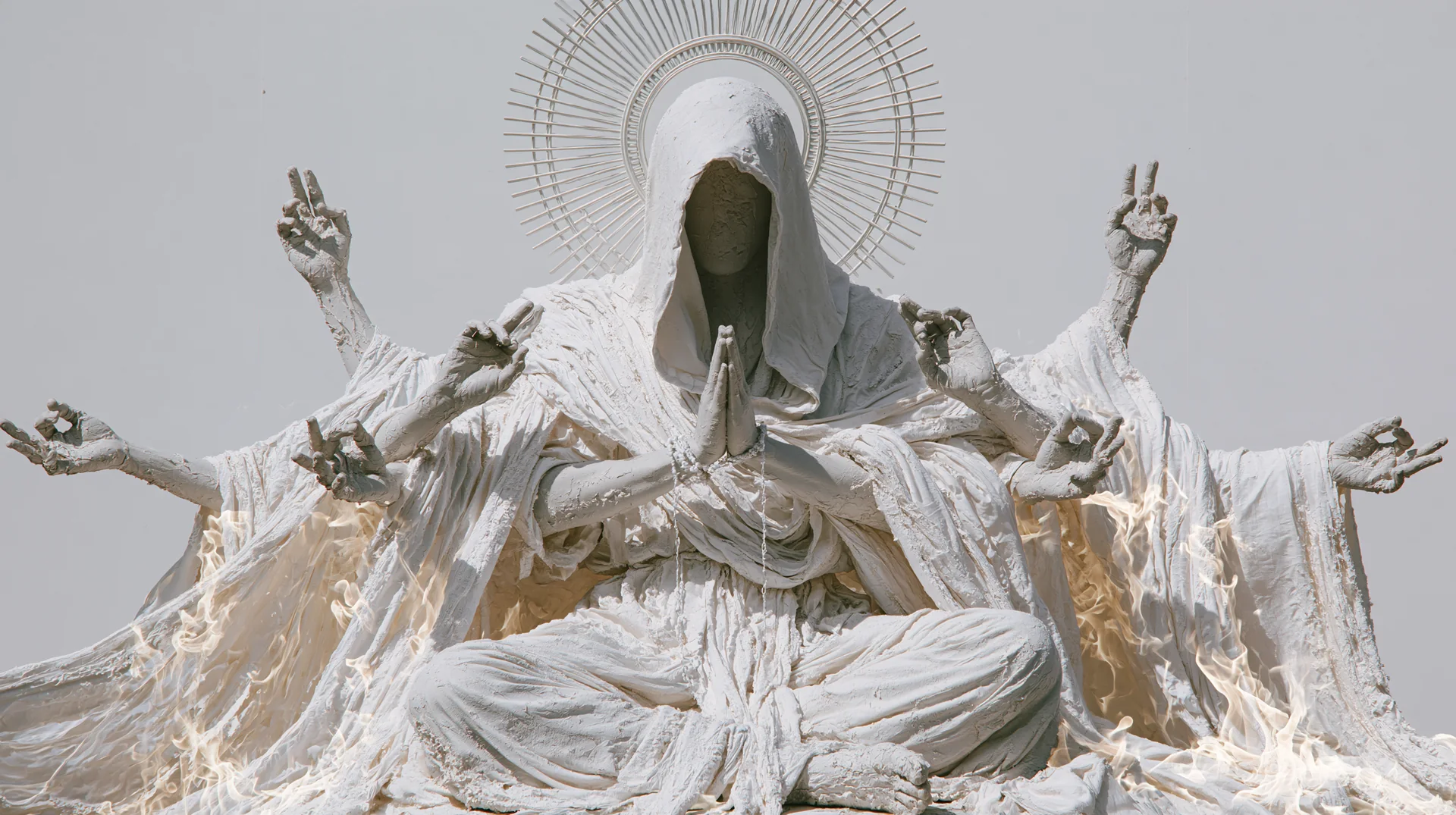 The figure transformed into white beneath a radiant halo